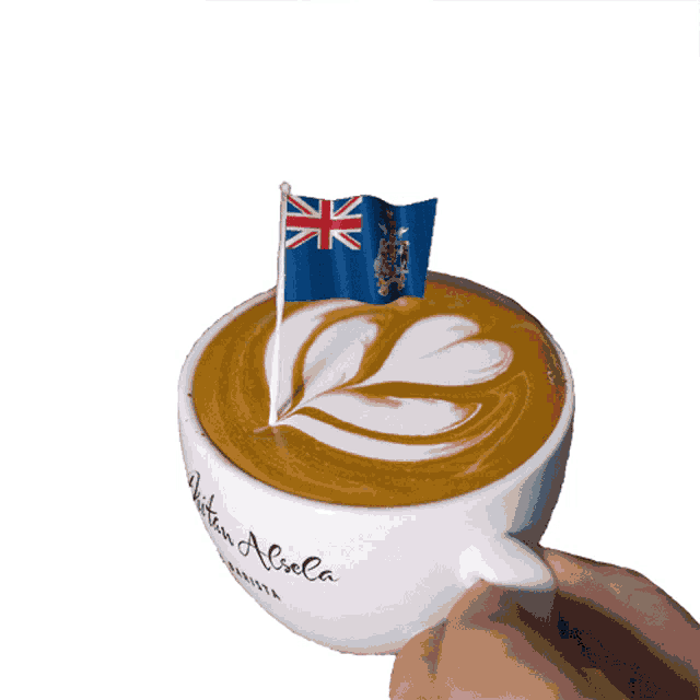 a cup of coffee with a flag on top of it
