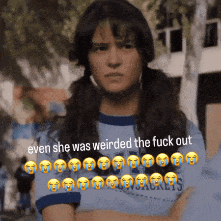 a girl with pigtails and a t-shirt that says chicago cubs
