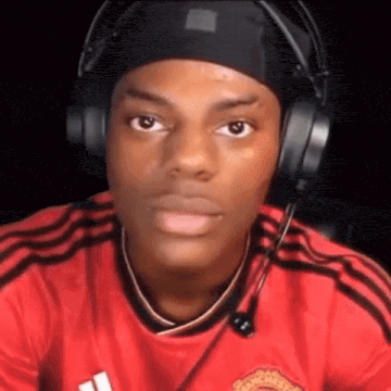 a young man wearing headphones and a headband .