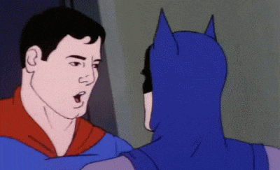 a cartoon of superman and batman having a conversation .