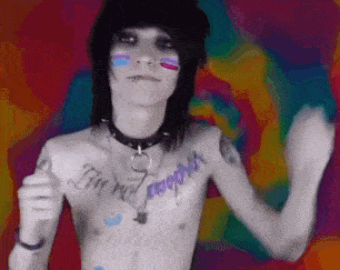 a shirtless man with a tattoo on his chest that says i 'm not a robot