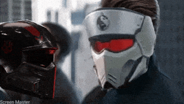 a man wearing a helmet with the word screen master on the bottom right corner