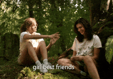 two girls are sitting under a tree with the words girl best friends written below them