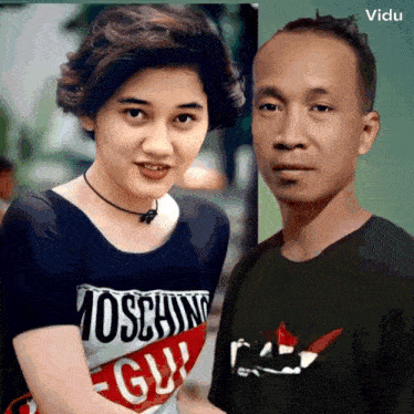 a woman wearing a moschino shirt is next to a man