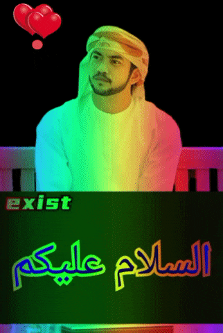 a man in a turban sits on a bench next to a sign that says " exist "