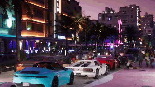 cars are parked in front of a building that says ' hotel dior ' on it