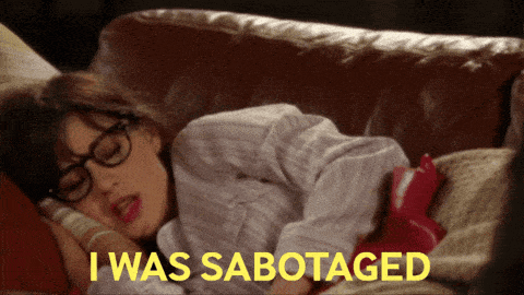 a woman laying on a couch with the words " i was sabotaged " on the bottom