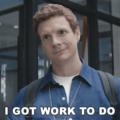 a man in a blue shirt says " i got work to do " in white letters