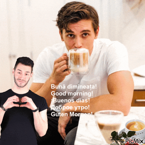 a man sitting at a table drinking a cup of coffee while another man makes a heart shape with his hands