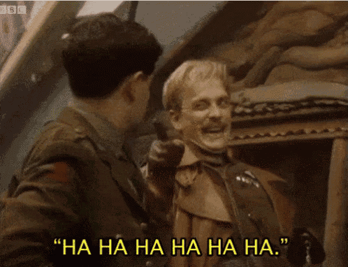 two men are laughing and one of them is saying ha ha ha ha ha