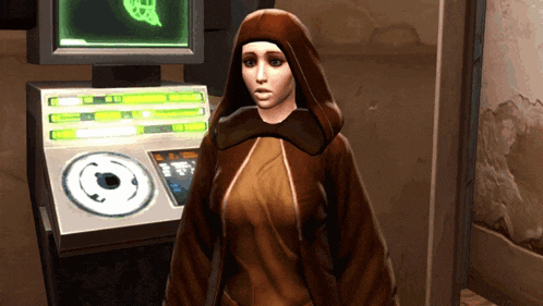 a woman in a brown robe stands in front of a computer