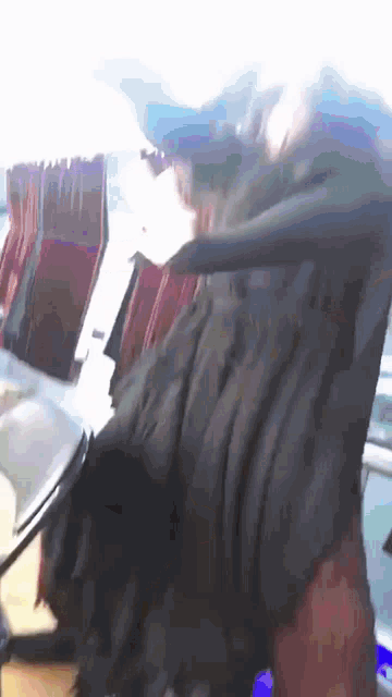 a person 's head is visible in a blurry picture