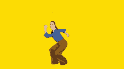 a woman in a blue shirt and brown pants is jumping in the air against a yellow background .