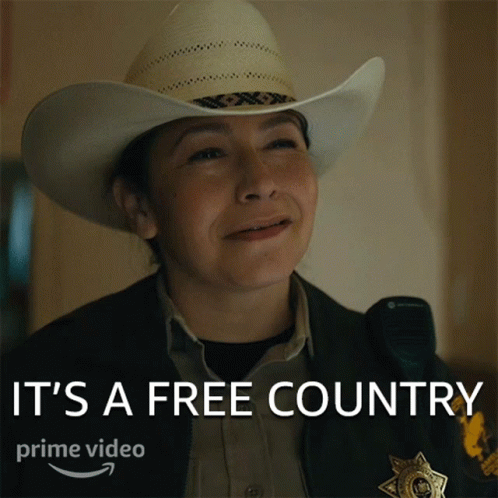 Its A Free Country Deputy Sheriff Joy GIF - Its A Free Country Deputy Sheriff Joy Outer Range GIFs