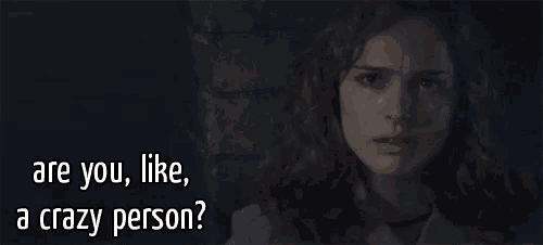 a woman in a dark room with the words are you like a crazy person below her