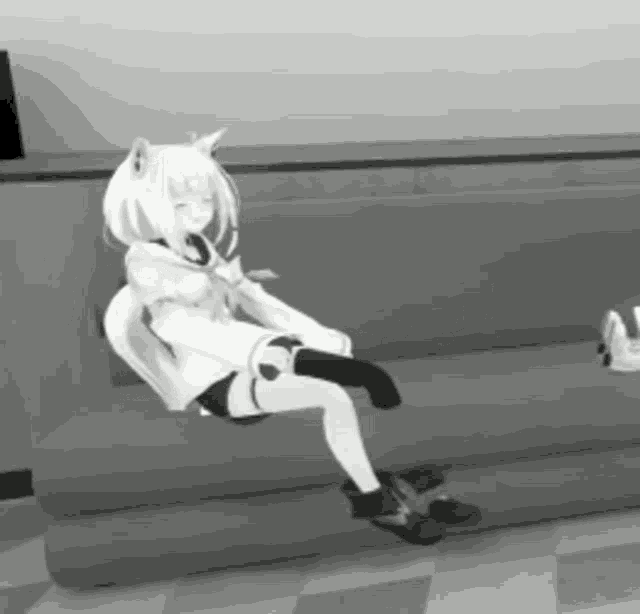 a black and white photo of a cartoon character sitting on a couch