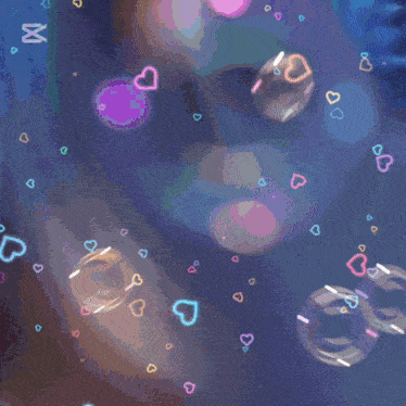 a purple background with hearts and the letter m