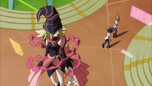 a girl in a witch costume is standing in front of a sign that says " welcome to the world of magical girls "