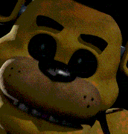 a close up of a yellow teddy bear with glowing eyes and a black background .