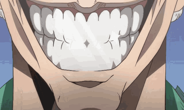 a close up of a person 's teeth with a diamond in the center
