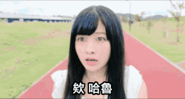 a girl with chinese characters on her face