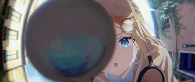 a close up of a girl with a magnifying glass