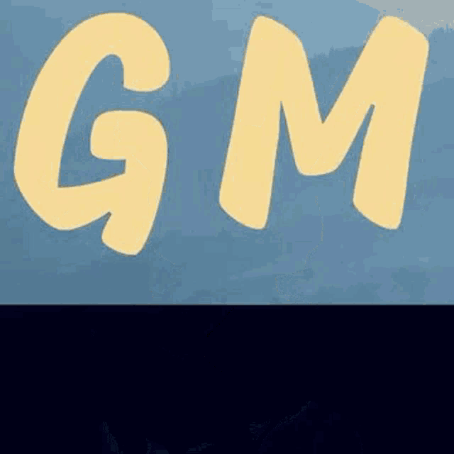 the letters gm are yellow on a blue background .