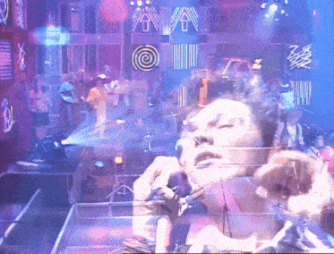 a double exposure of a woman singing in front of a sign that says ' vava '