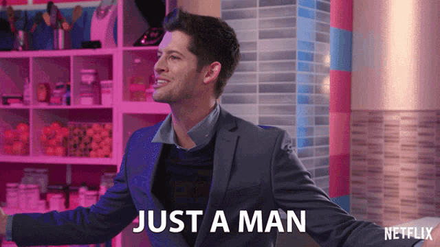 a man in a suit says just a man in a netflix advertisement