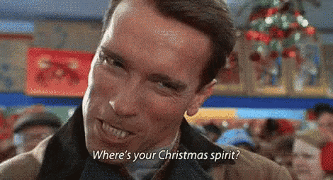 arnold schwarzenegger is smiling and talking about christmas spirit .