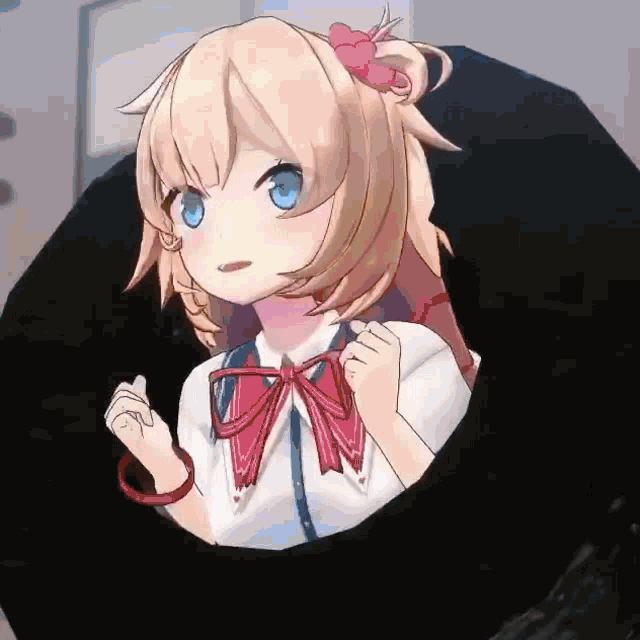 a girl with blonde hair and blue eyes is holding an umbrella in her hand .