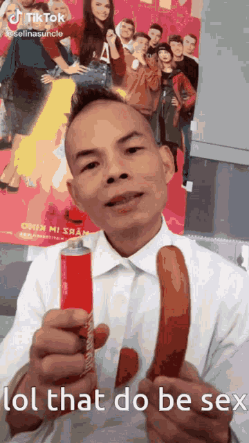 a man is holding a can of soda and a sausage and says lol that do be sex