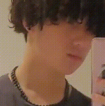 a person is taking a picture of themselves in a mirror
