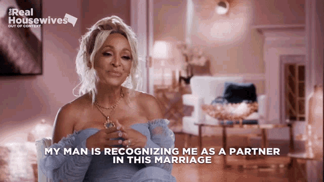 a woman says my man is recognizing me as a partner in this marriage on the screen