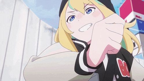 a girl with blonde hair and blue eyes is smiling