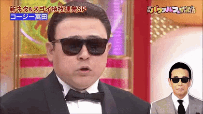a man wearing sunglasses and a tuxedo is standing in front of a sign that says sp