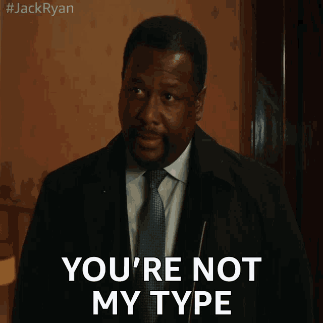 a man in a suit and tie says you 're not my type on a screen