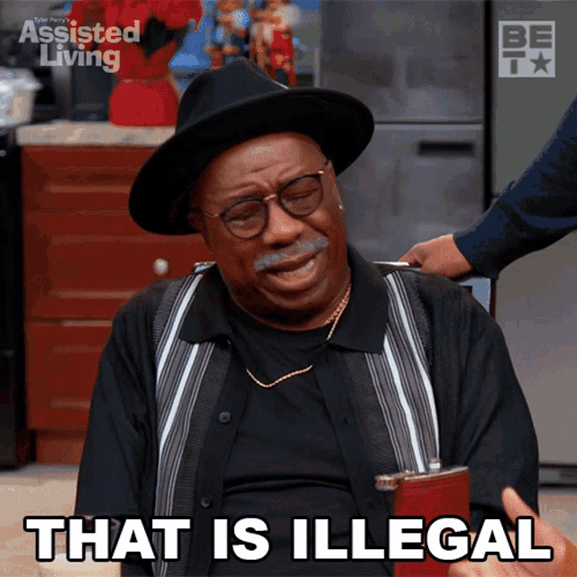 a man in a black hat and glasses says that is illegal