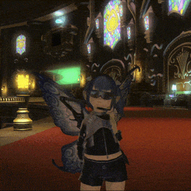 a girl with butterfly wings is standing in a room