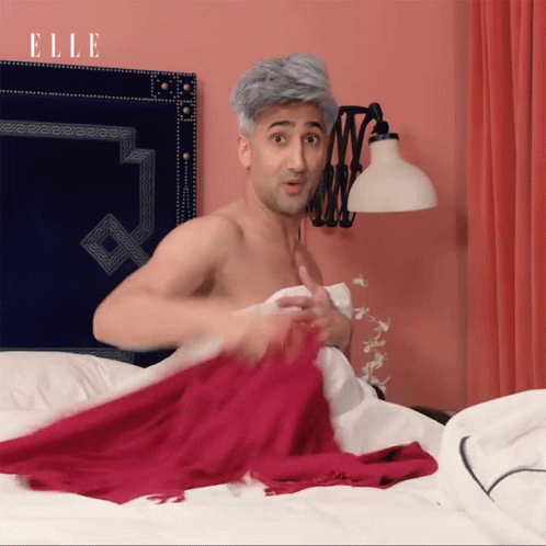 Throwing Tan France GIF - Throwing Tan France Covering GIFs