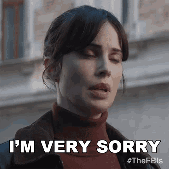 a woman with her eyes closed is saying i 'm very sorry .