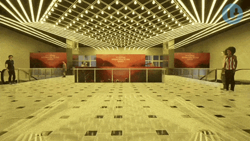 a large hallway with a sign that says ' international film festival london ' on it