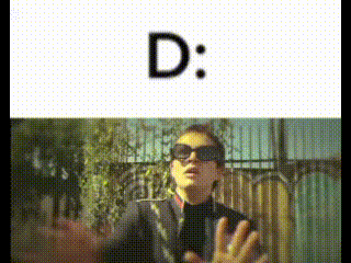 a man wearing sunglasses is standing in front of a fence and the letter d is above him