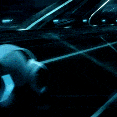 a view of an escalator going down a dark tunnel