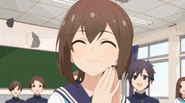 a girl in a school uniform is smiling in front of a group of students