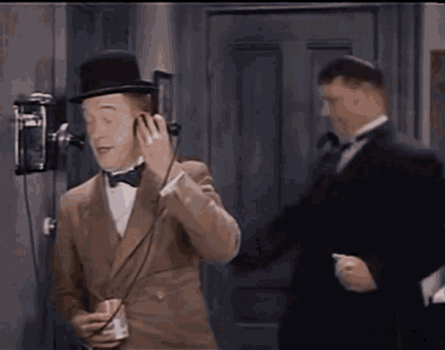 Laurel And Hardy Phone Call GIF - Laurel And Hardy Phone Call Milk Can GIFs