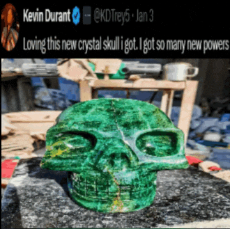 a kevin durant tweet shows a green skull on a table
