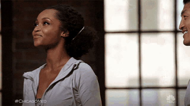 a woman in a white shirt with #chicagomed on it