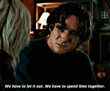 a man talking to a woman with the words we have to let it out