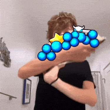 a person with blue balls on their face